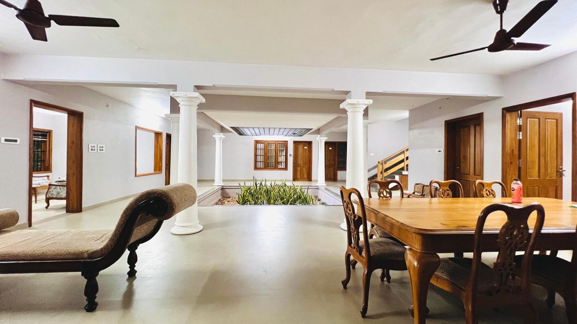 Appartement Waterfront By Palmyra à Kollam Extérieur photo