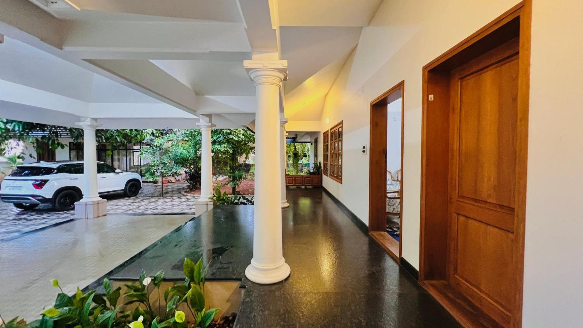 Appartement Waterfront By Palmyra à Kollam Extérieur photo