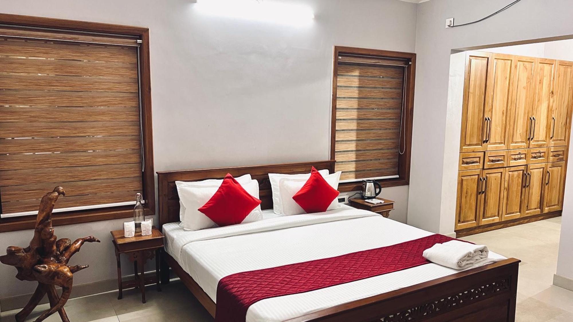 Appartement Waterfront By Palmyra à Kollam Extérieur photo