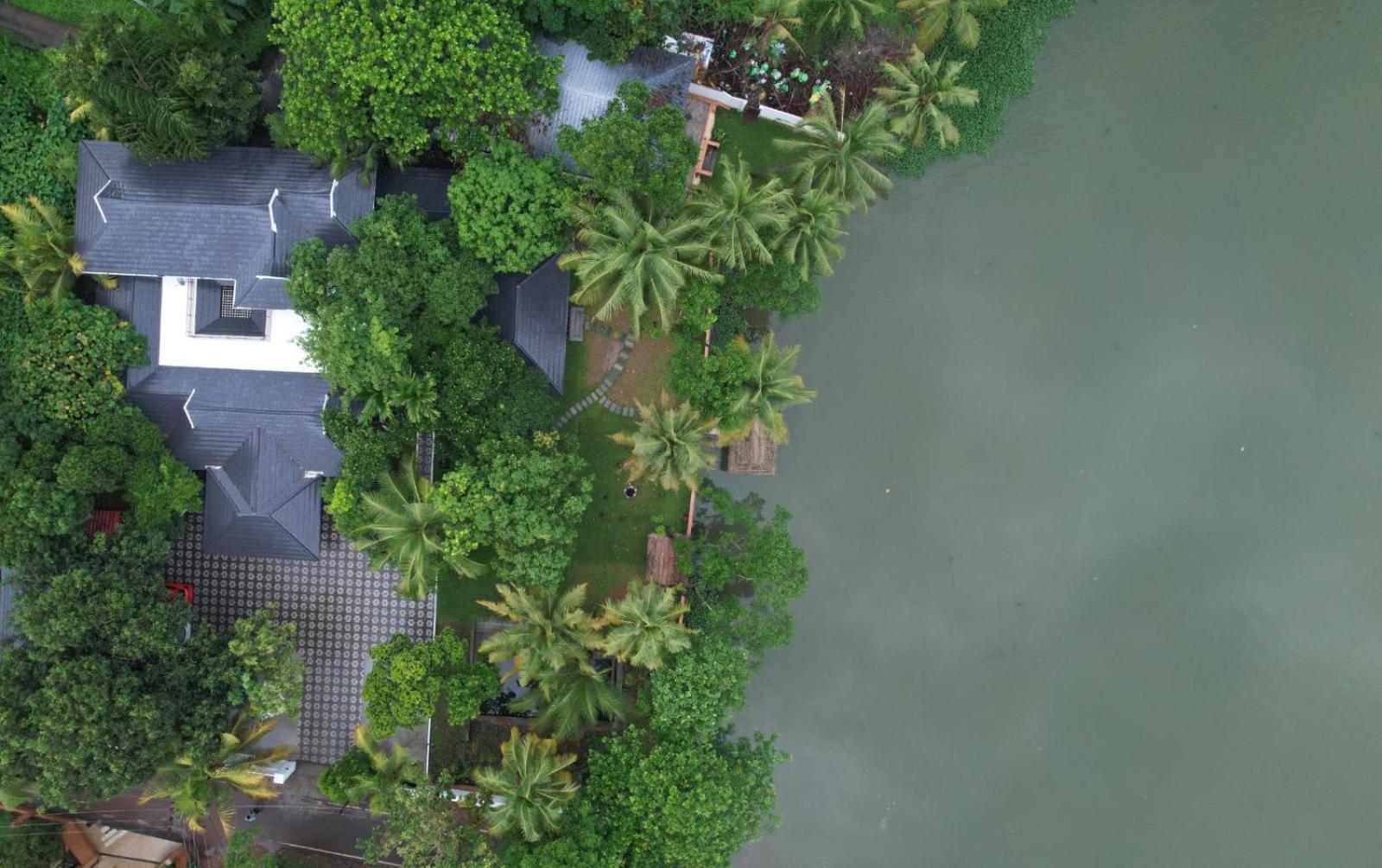 Appartement Waterfront By Palmyra à Kollam Extérieur photo